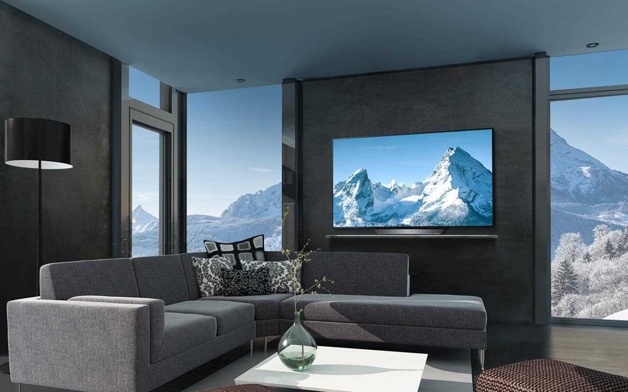 An LG OLED TV in a modern living room.