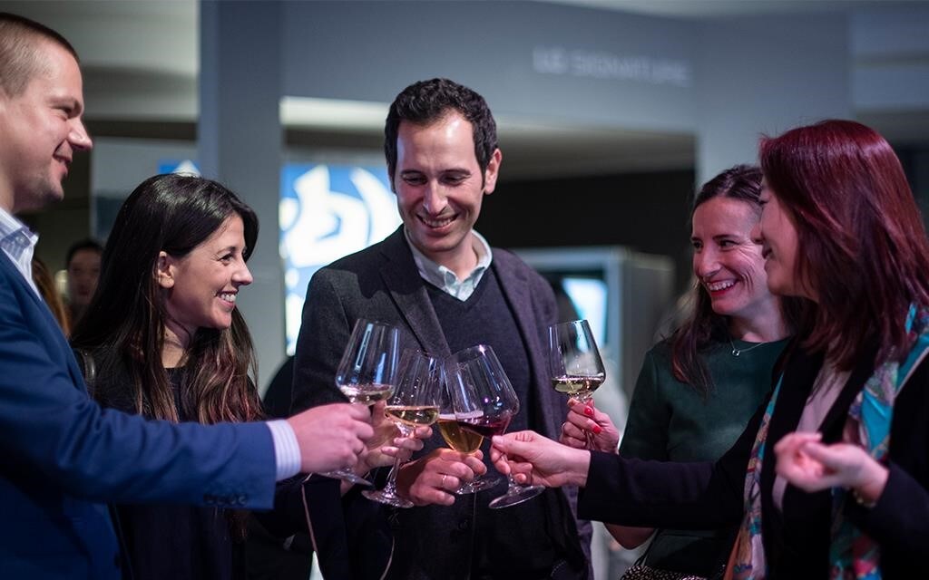 VIP guests cheers their glasses during a wine tasting for Allendorf at LG SIGNATURE ARTWEEK