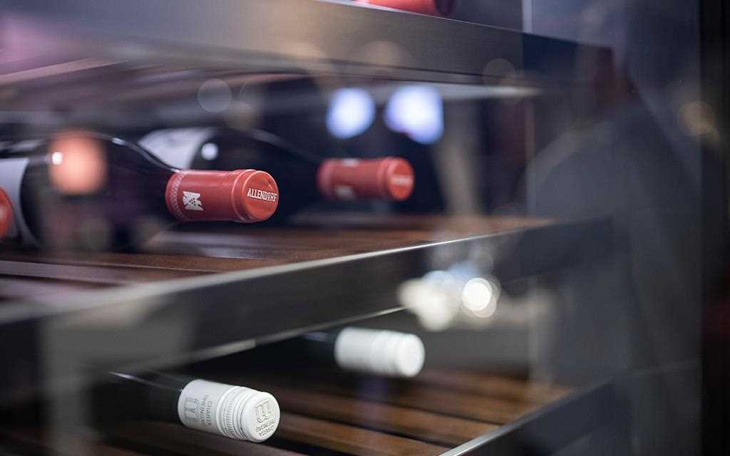 Bottles of wine sit inside the LG SIGNATURE Wine Cellar, on show for the brands ARTWEEK event