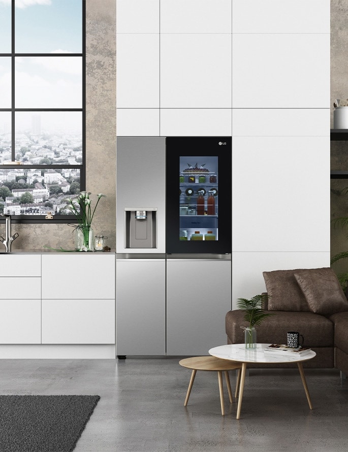 The latest model of the LG Instaview refrigerator in a kitchen, introduced by LG at CES 2021