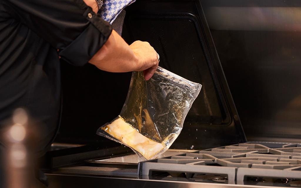 IFA 2018: A professional chef places fish inside the Sous-Vide cooking function in the SIGNATURE KITCHEN SUITE for LG 