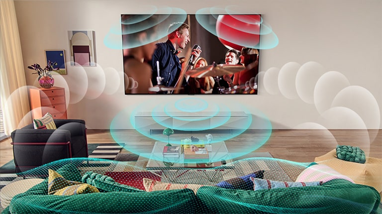 صورة لتلفزيون LG OLED في غرفة تعرض حفلًا موسيقيًا. الفقاعات التي تصور الصوت المحيطي الافتراضي تملأ المساحة.