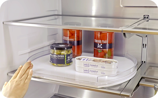 Rotating refrigerator shelf that brings items stored at the back forward for easier access