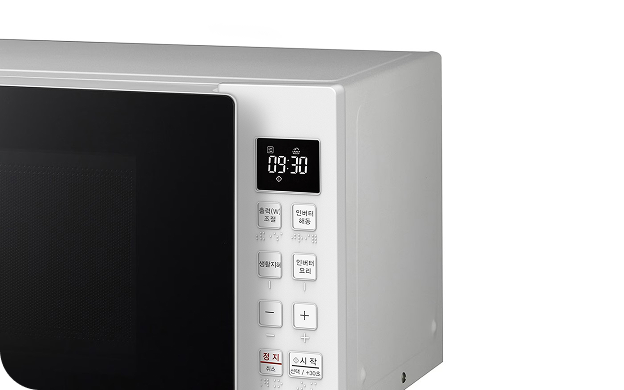 Microwave Touch Guide that helps users with visual impairments or hand tremors recognize and operate touch buttons