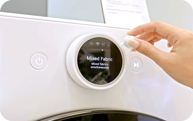 Washer/Dryer Easy Ball accessory that allows users to turn the dial easily without gripping and provides a tactile reference point