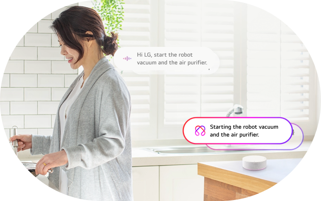 A user controlling multiple LG home appliances at once with a single voice command and receiving audio feedback on their status