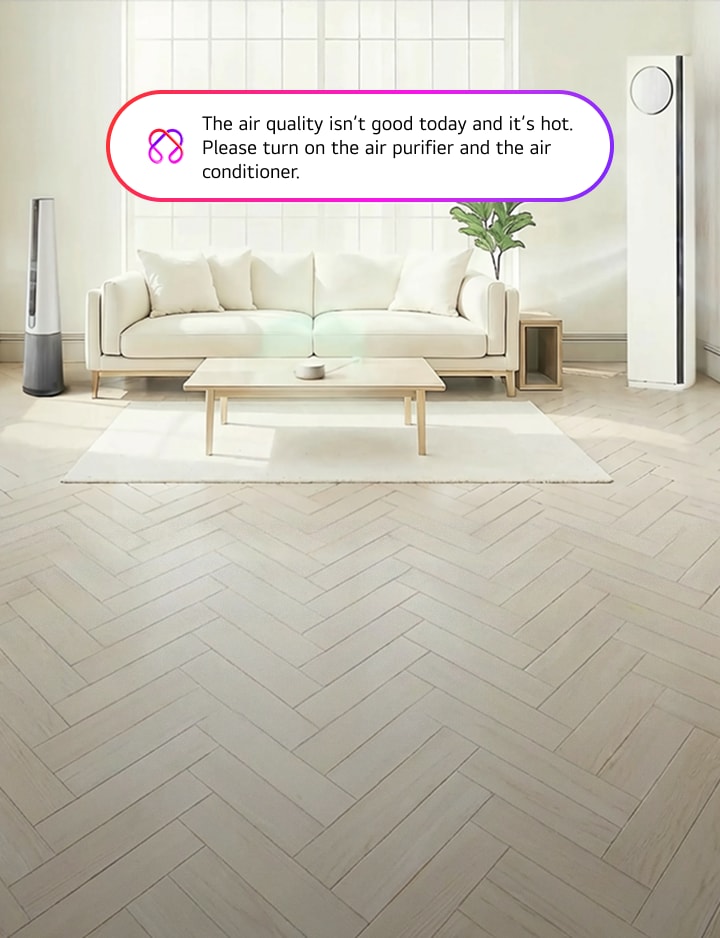 A living room scene with a sofa and table, an air purifier and an air conditioner placed in the room, and a speech bubble displaying the text “The air quality isn’t good today and it’s hot. Please turn on the air purifier and the air conditioner.”​