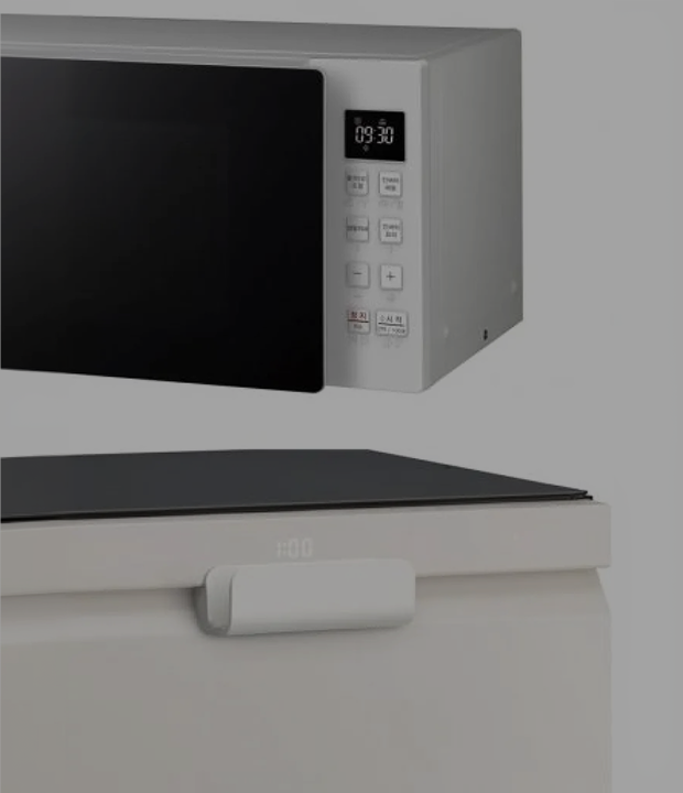 LG microwave with Braille pad and dishwasher with Easy Handle, part of LG's expanded Comfort Kit lineup for universal accessibility.