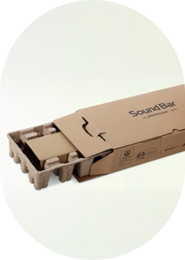 An image of 100% recycled pulp mold packaging used for a soundbar
