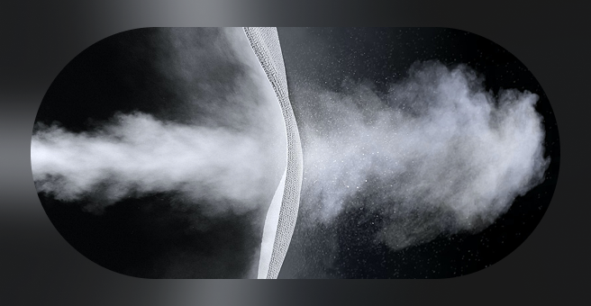 A visual representation of a powerful steam jet penetrating through dense fabric mesh.