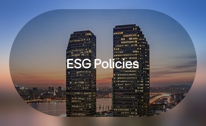 A section banner with an oval-shaped frame featuring the LG Twin Towers, with 'ESG Policies' written in white text in the center.