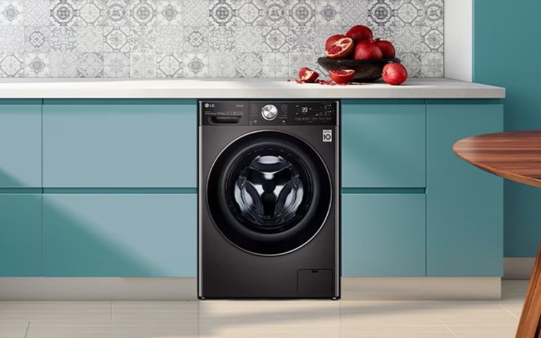 LG washing machine installed in the kitchen