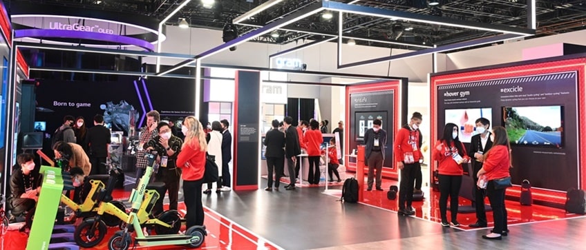 At the LG Labs booth, people are watching the products.