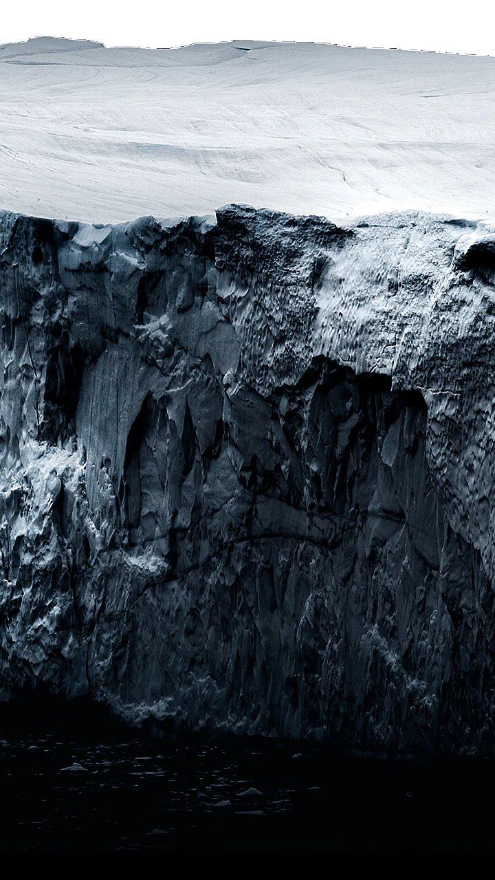 The words 'Super Black' appear in a bold font, and then a rugged iceberg with intricate grooves appears from below