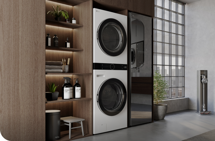 LG WashTower en una moderna sala de lavandería, que muestra una elegante lavadora y secadora apiladas que ahorran espacio.
