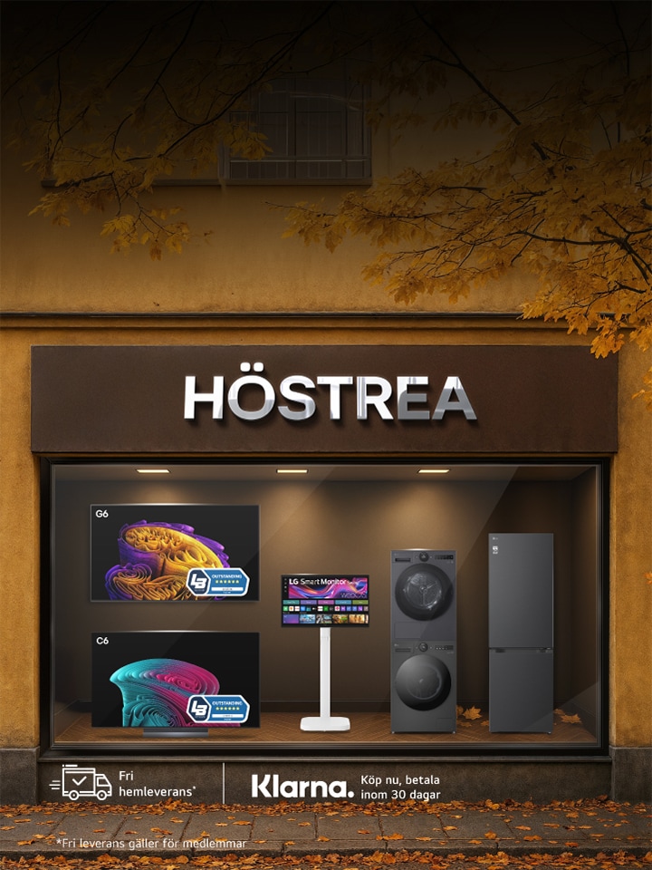 Skyltfönster med texten "HÖSTREA" visar LG-produkter inklusive en TV, laptop, WashTower tvättmaskin/torktumlare och ett kylskåp. Höstlöv och varma färger signalerar en höstkampanj