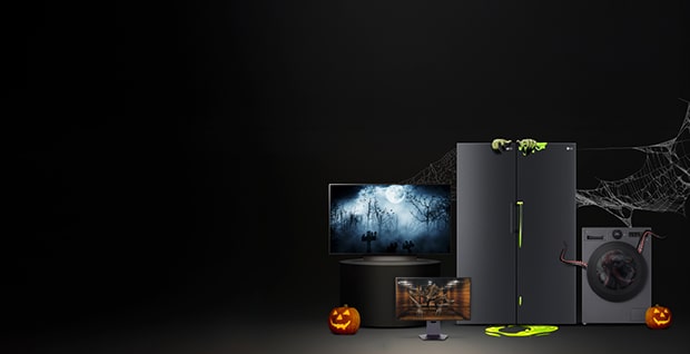 Halloween-tema LG-produktutställning med en smart-TV, bildskärm, kylskåp och tvättmaskin mot en mörk bakgrund med spindelnät, lysande gröna detaljer och uthuggna pumpadekorationer.