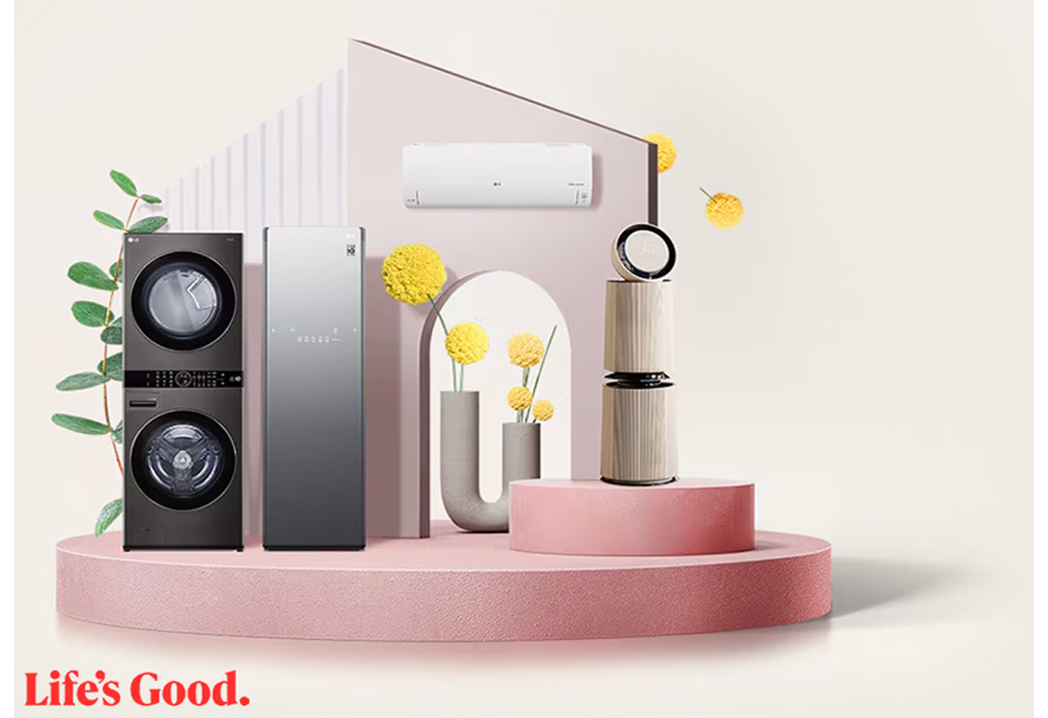 LG WashTower, Styler, air conditioner, and air purifier showcased on a modern stage with decorative flowers