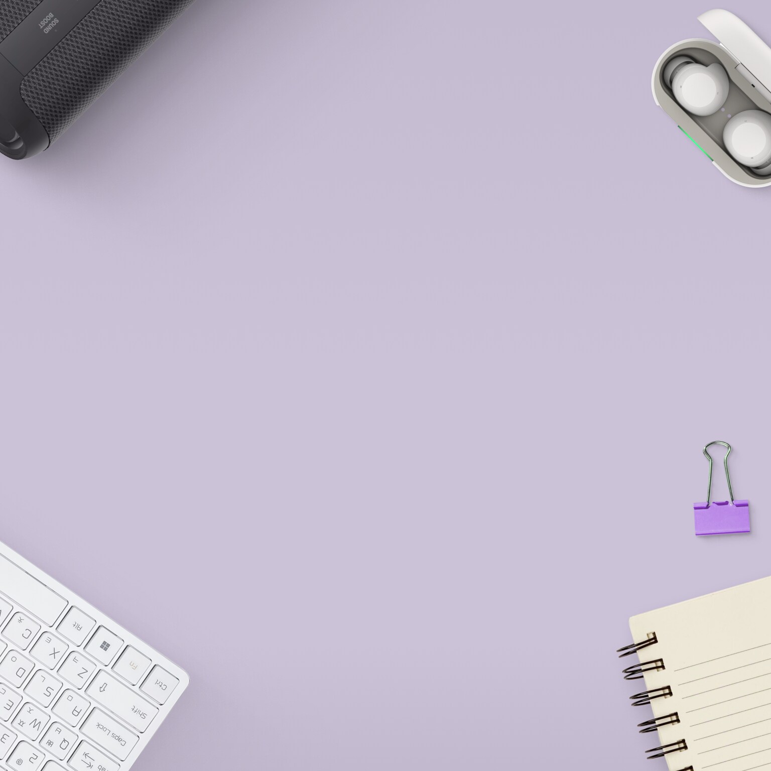 On the table, there’s a keyboard, earphones, a notepad, and an xboom, with ThinQ On in the center.