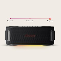 A front view of the LG xboom with orange light glowing.