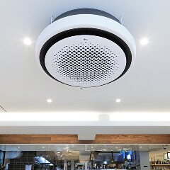 La cassette ronde de LG est installée au plafond du restaurant.