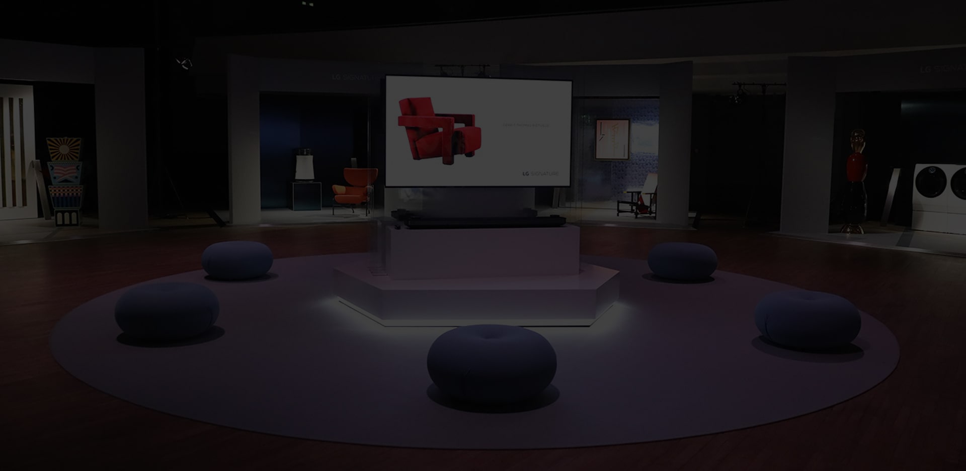lg signature oled tv is displayed right in the middle of the stage at artweek in germany