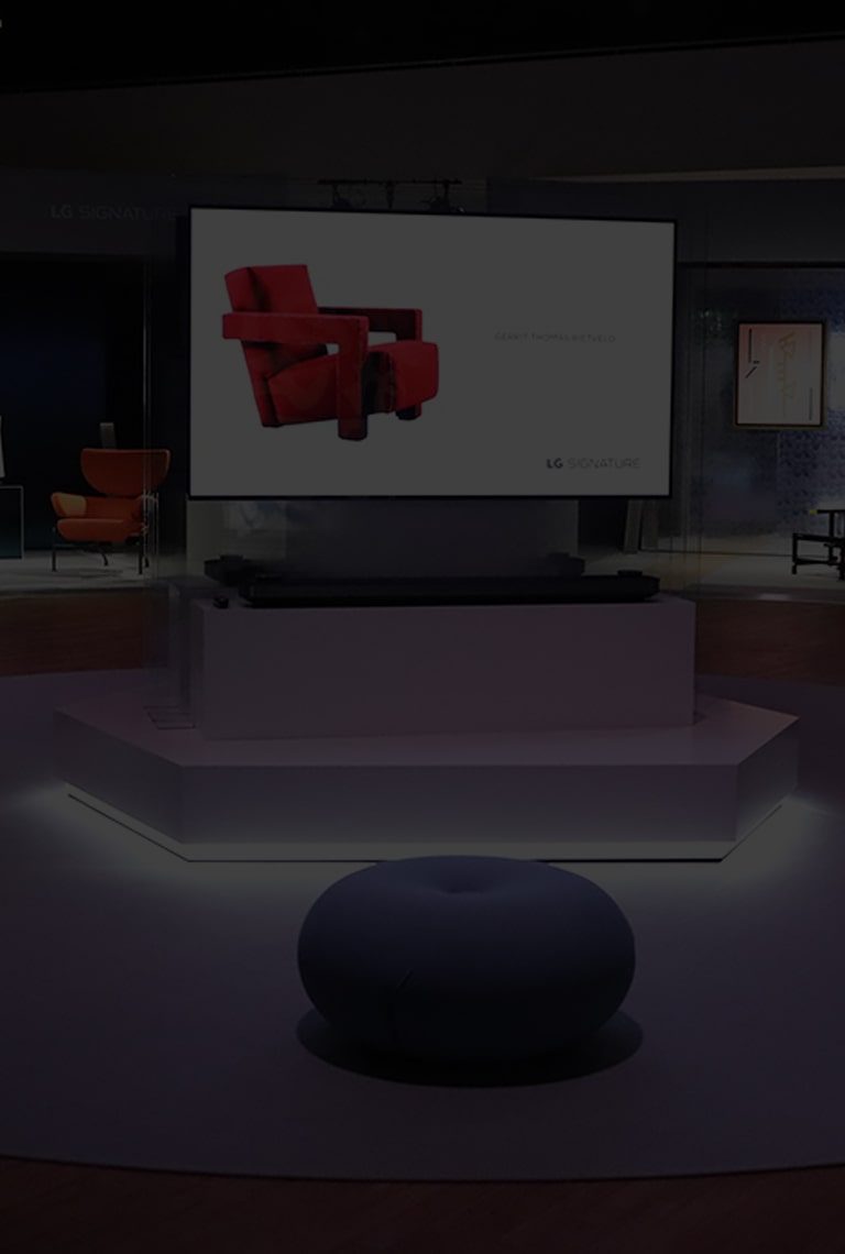 lg signature oled tv is displayed right in the middle of the stage at artweek in germany