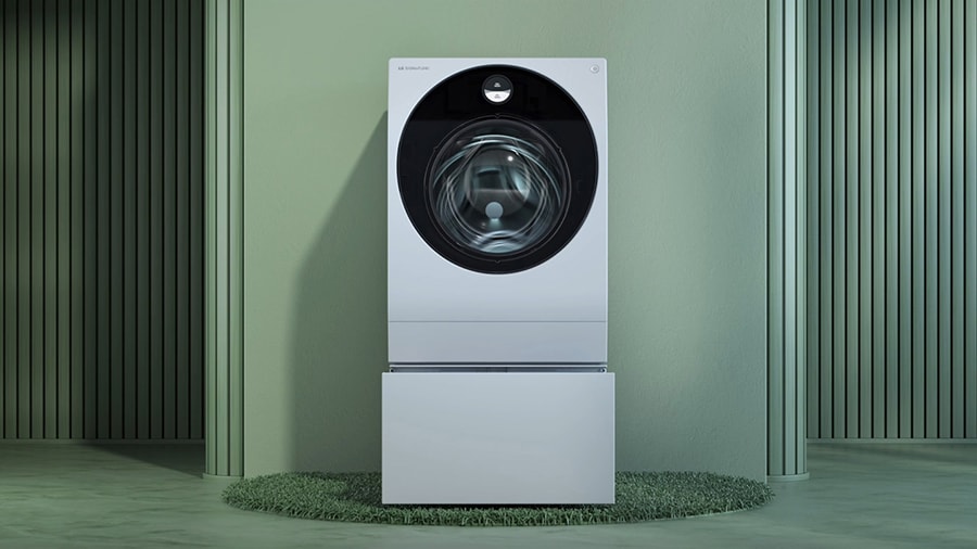 Die Waschmaschine von LG SIGNATURE steht in einer grünen künstlerischen Waschküche.