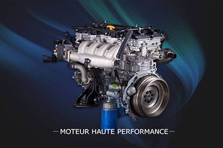 Complex gas engine with many different components combined. Includes a black top, a metallic cylinder, and front-facing rotating circular parts.