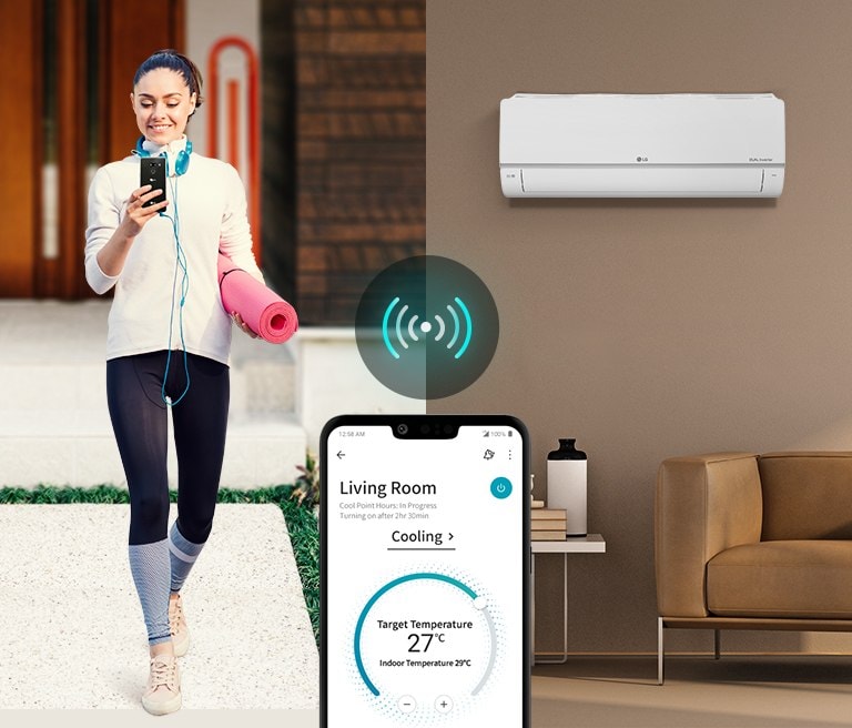 A woman who controls the air conditioner temperature with ThinQ™ while out.