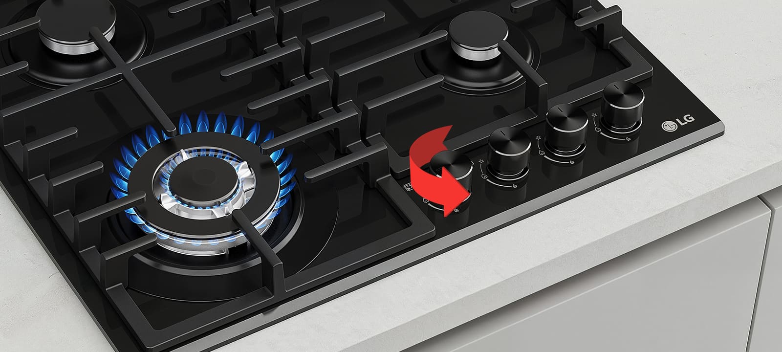 Close-up of black gas cooktop with blue flame burner and front rotary knobs for precise heat control adjustment.