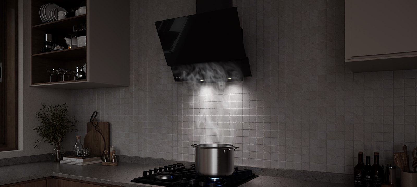 A black glass hood above a gas cooktop draws in steam rising from a pot while cooking in a modern kitchen.