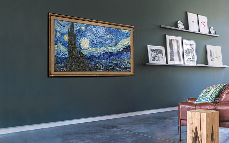 An image of a wall-mounted gallery design showing an artwork in the living room.
