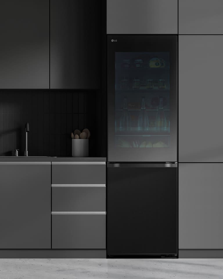 Modern kitchen with a refrigerator that blends seamlessly into surrounding cabinetry
