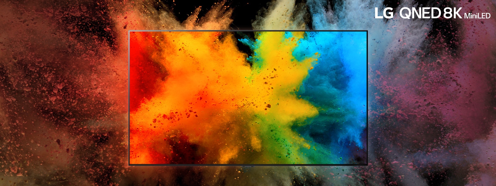 An LG QNED in a dark room. Dyed powders create an explosion of rainbow colors on the TV.