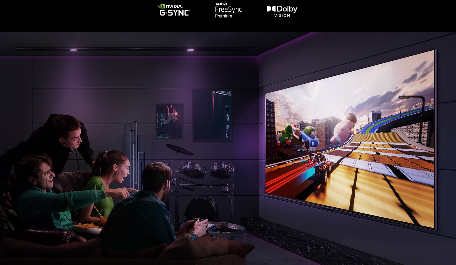 An Image Of Three Men Playing A Racing Game On An Lg Oled Tv In A Modern City Apartment.