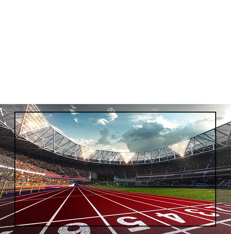 TV screen showing a stadium with a view of the running track up close. Stadium is filled with spectators.