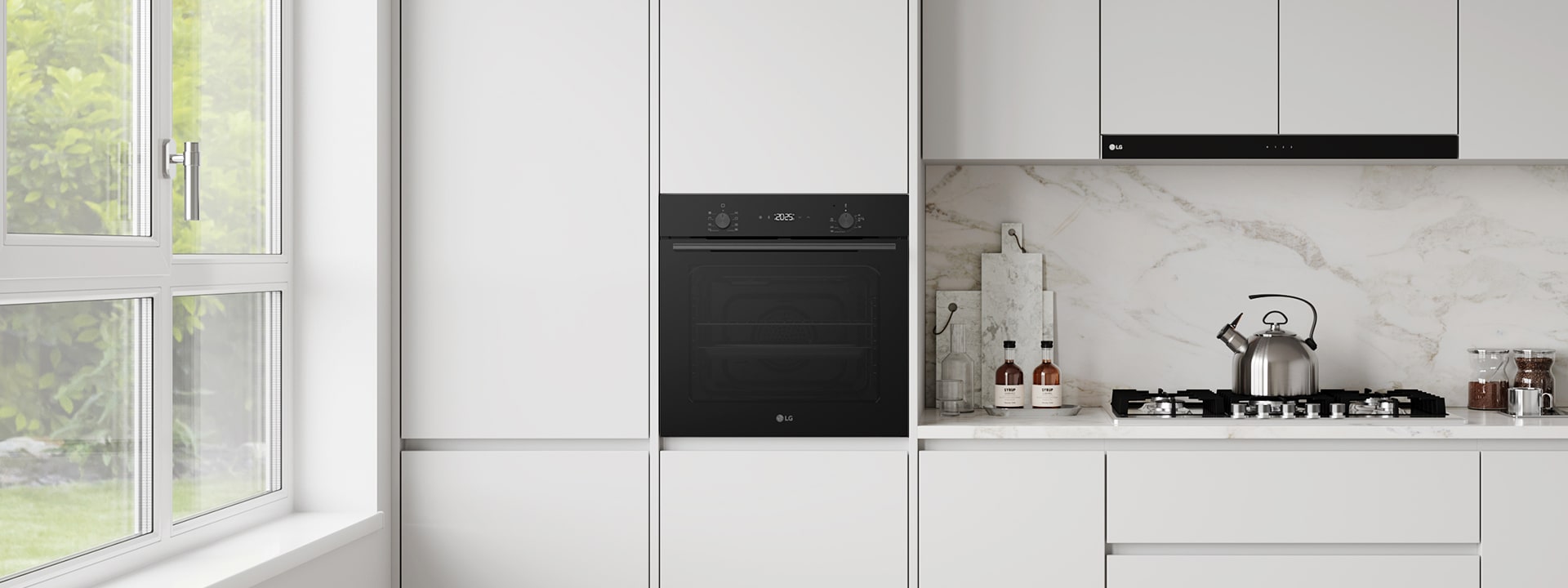 Modern white kitchen with built-in black radiant cooktop, oven, hood, and sink.