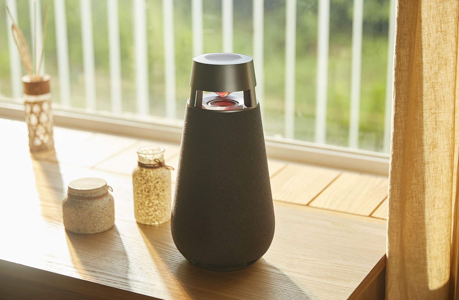 An image of XBOOM 360 XO3 on the dining table in the morning.