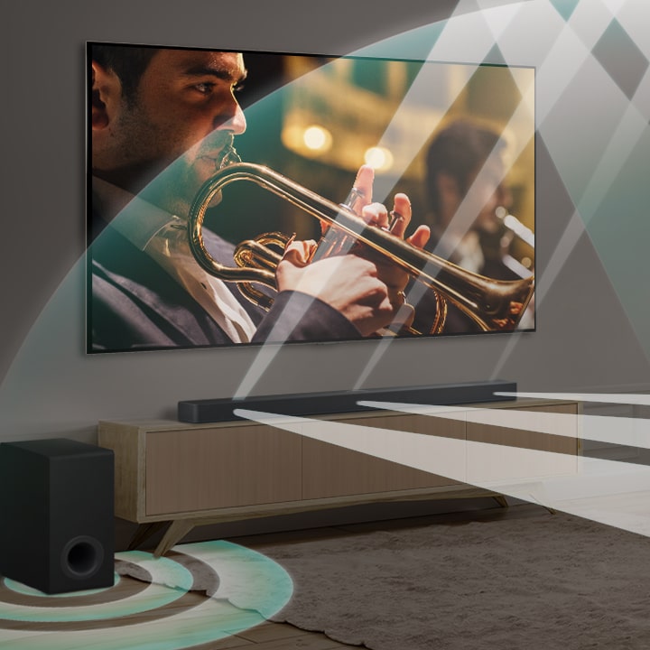 An LG Soundbar, LG TV, and subwoofer are in a modern city apartment. The LG Soundbar emits three branches of soundwaves, made of white droplets that float along the bottom of the floor. More white droplet soundwaves fire up from the top of the soundbar. Next to the Soundbar is a subwoofer, creating a sound effect from the bottom. As a whole, they are creating a dome effect across the room.