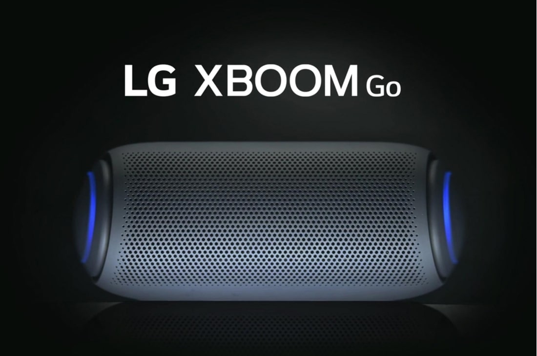 LG XBOOMGo PL5 | 20W | 2ch | Meridian  Technology| Dual Action Bass, Front view of LG XBOOM Go with green lighting., PL5