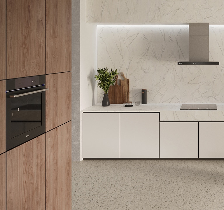 This is an image of the kitchen interior with an LG built-in oven, hood, and Induction hob installed.