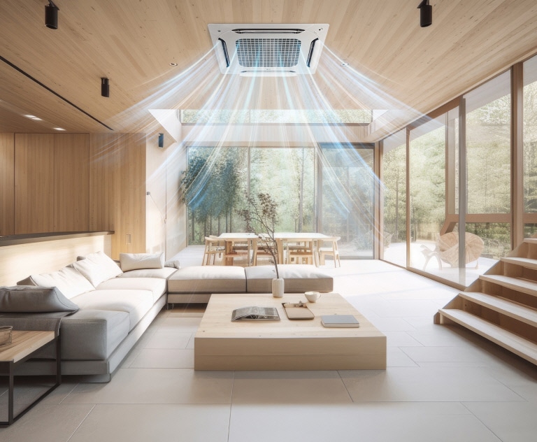 An LG Ceiling Mounted Cassette circulates airflow in a warm-toned living room with a sofa, table, and trees.