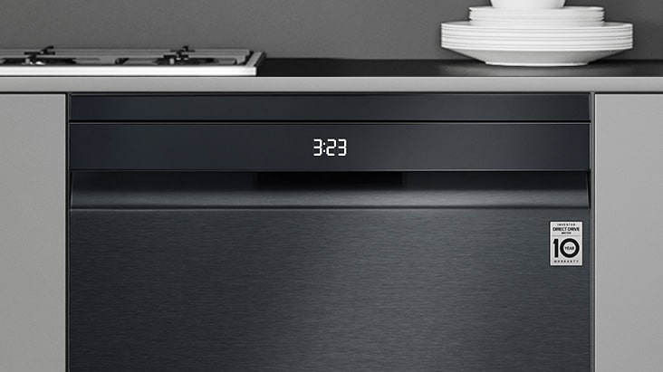 Front view of dishwasher showing a digital clock on the display panel