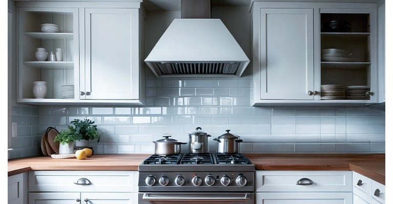 Kitchen range hood extracting cooking fumes to improve indoor air quality