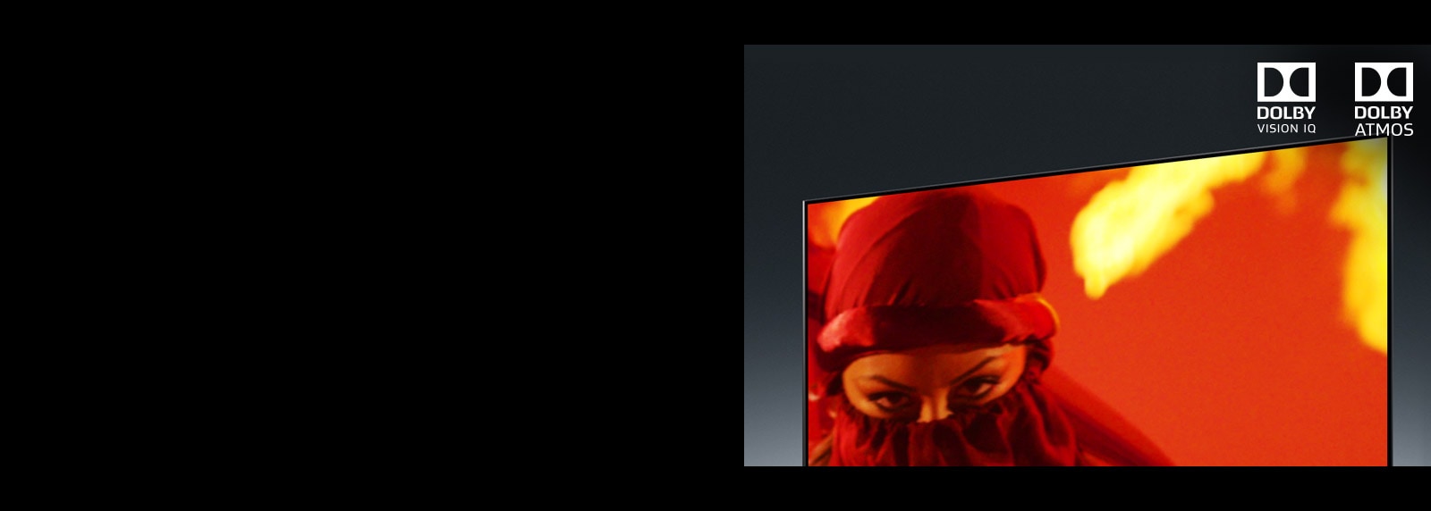 A TV screen is showing a close-up of a woman's eyes in a movie.