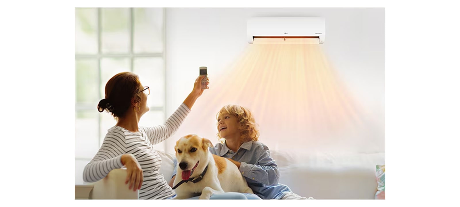 A grandmother and grandson are lying on the sofa and getting a warm breeze