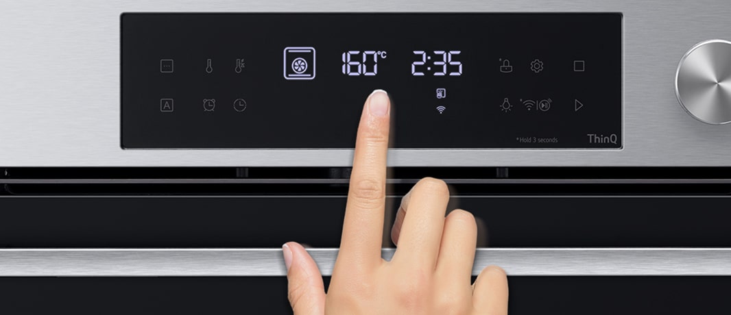 Image of pressing the EasyClean button on the product display with finger.