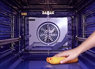 Image of wiping product floor with cloth.