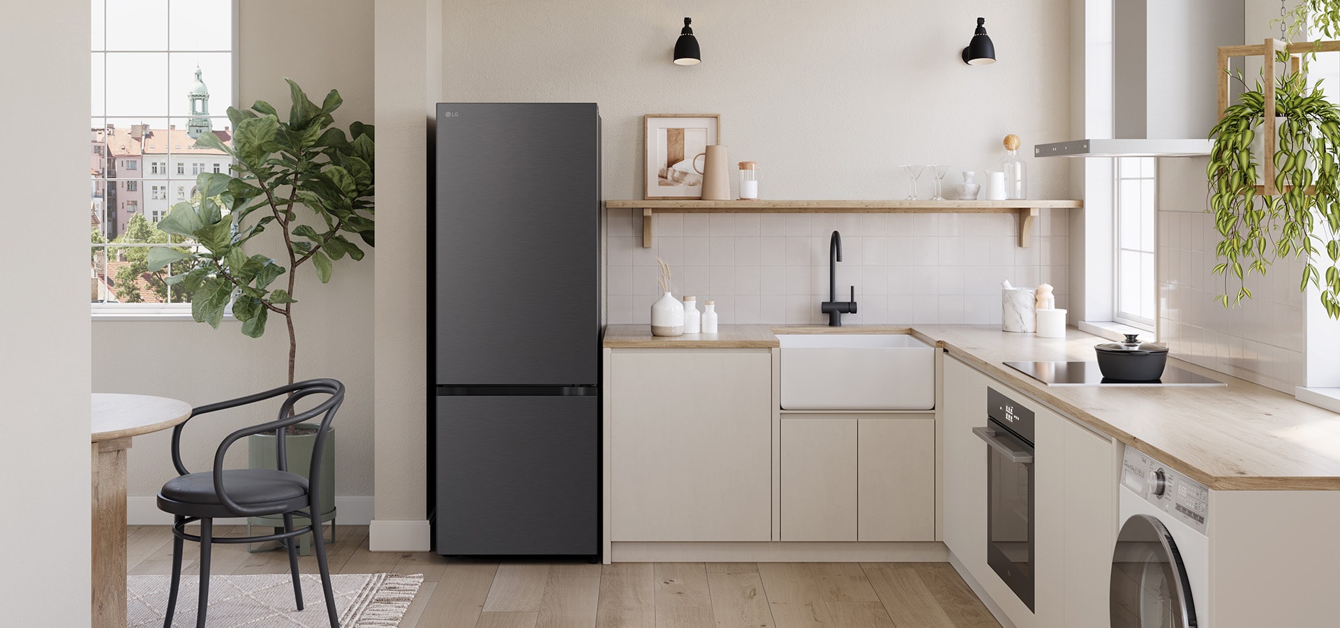Overall view of the kitchen with lg bottom freezer refrigerator with water dispenser installed beside the countertop.